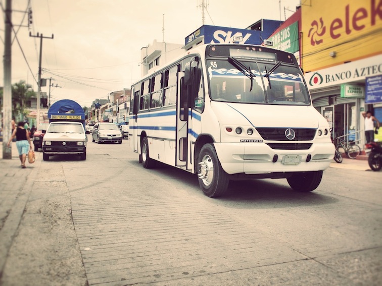 Colectivo (left) and chicken bus (right)