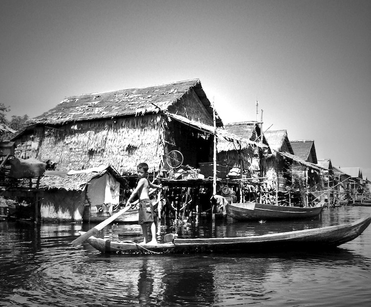 Kid in canoe Kompong Phluk